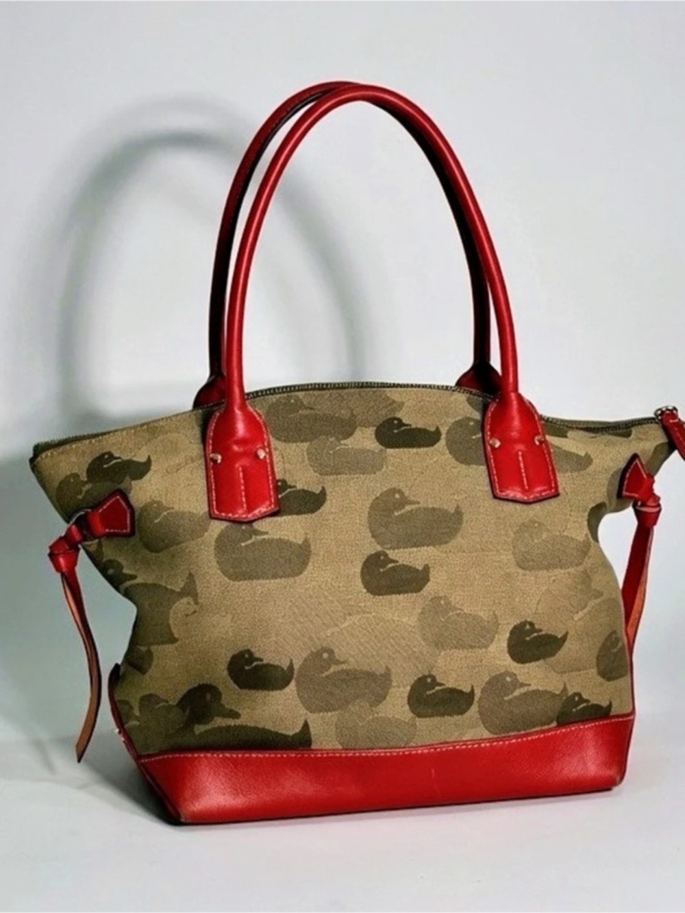 Vintage Dooney & Bourke jacquard wonder duck tote in beige brown red leathertrim